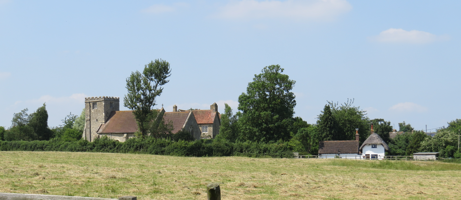 Church and thatched house near shabbington